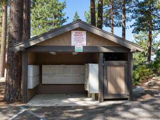 Discover convenient mail services at this property, featuring a secure and organized mailbox area.