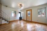 Step into this charming living space featuring a cozy wood-burning stove, perfect for chilly evenings.