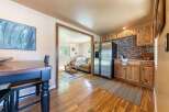 Discover this charming home featuring a spacious living area and a well-equipped kitchen with modern appliances and ample cabinet space.