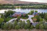 Experience luxury living with this stunning brick estate situated on a serene waterfront.