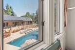 Experience luxury living with this stunning property featuring a sparkling swimming pool and an inviting hot tub, perfect for relaxation and entertainment.