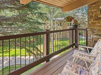 Enjoy the serene mountain views from this charming balcony, perfect for morning coffee or evening relaxation.