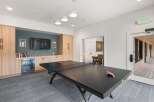 Enjoy leisure and entertainment in this vibrant community space, featuring a professional ping pong table perfect for friendly competitions.