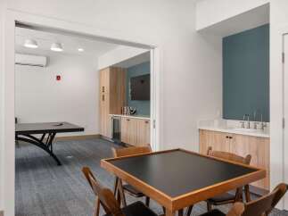 This versatile community space offers a perfect blend of recreation and relaxation.