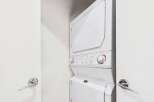 This stacked Maytag washer and dryer unit is perfect for maximizing space in your laundry room.