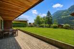 Enjoy breathtaking mountain views from this charming property's patio, perfect for al fresco dining.