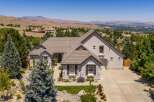 Experience luxury living in this stunning custom-built home, nestled in a picturesque landscape with breathtaking panoramic views.