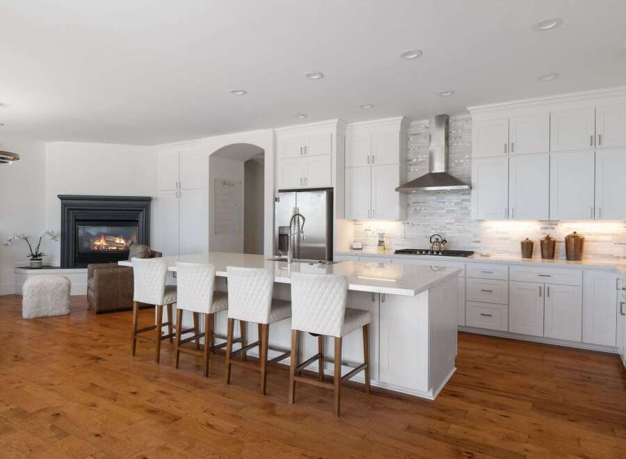 Experience luxury and comfort in this stunning open-concept kitchen and living area.