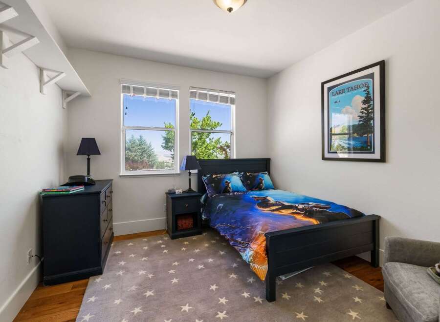 This charming bedroom features a comfortable bed with themed bedding, perfect for a young adventurer.