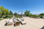 Enjoy breathtaking panoramic views from this stunning backyard oasis, perfect for entertaining or relaxing.