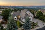 Experience luxury living in this stunning estate, boasting panoramic views of the city and mountains.