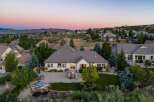 Experience luxury living in this stunning home, featuring a spacious backyard with a relaxing hot tub and a large patio perfect for entertaining.