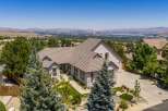 Experience luxury living in this stunning home with breathtaking panoramic views of the valley and mountains.