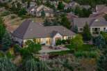 Experience luxury living in this stunning home, featuring a spacious backyard with a relaxing hot tub and an inviting patio perfect for entertaining.