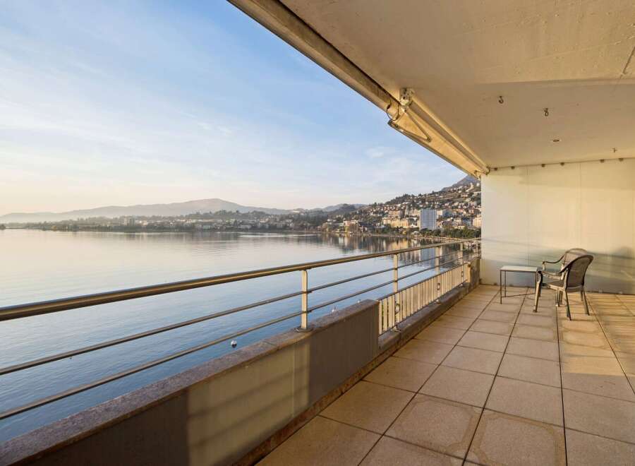 Experience breathtaking lake views from this expansive balcony, perfect for enjoying your morning coffee or evening relaxation.