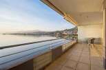 Experience breathtaking lake views from this expansive balcony, perfect for enjoying your morning coffee or evening relaxation.