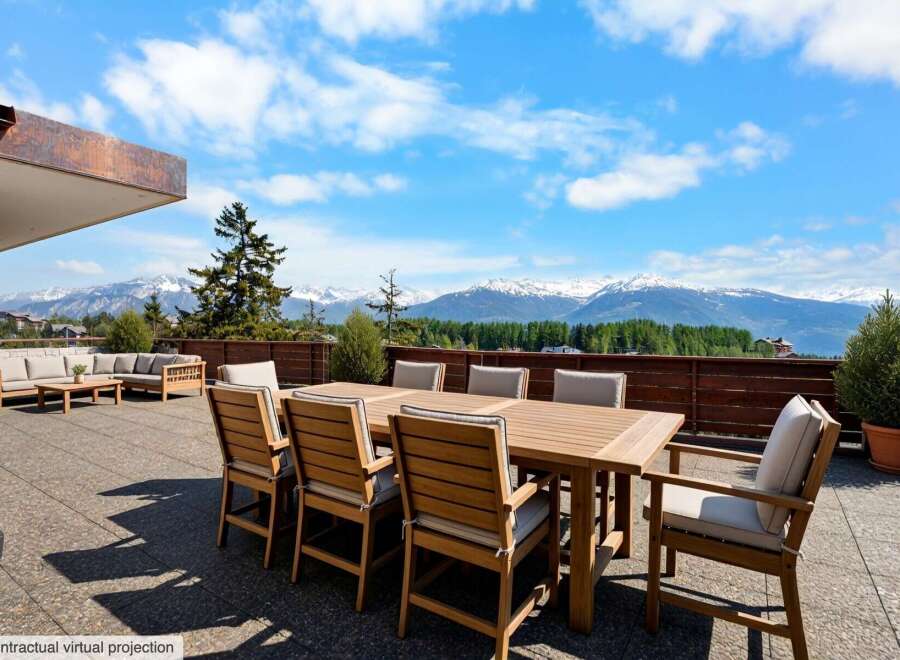 Enjoy breathtaking mountain views from this expansive patio, perfect for outdoor dining and entertaining.