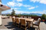 Enjoy breathtaking mountain views from this expansive patio, perfect for outdoor dining and entertaining.