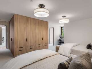 This spacious bedroom features two twin beds, perfect for accommodating guests or family.