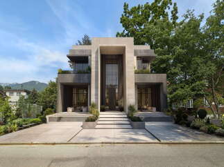 Experience modern luxury in this stunning architectural masterpiece, featuring a grand entrance with soaring ceilings and expansive glass.