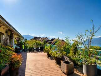 Experience breathtaking panoramic views from this stunning rooftop terrace, perfect for entertaining or serene relaxation.