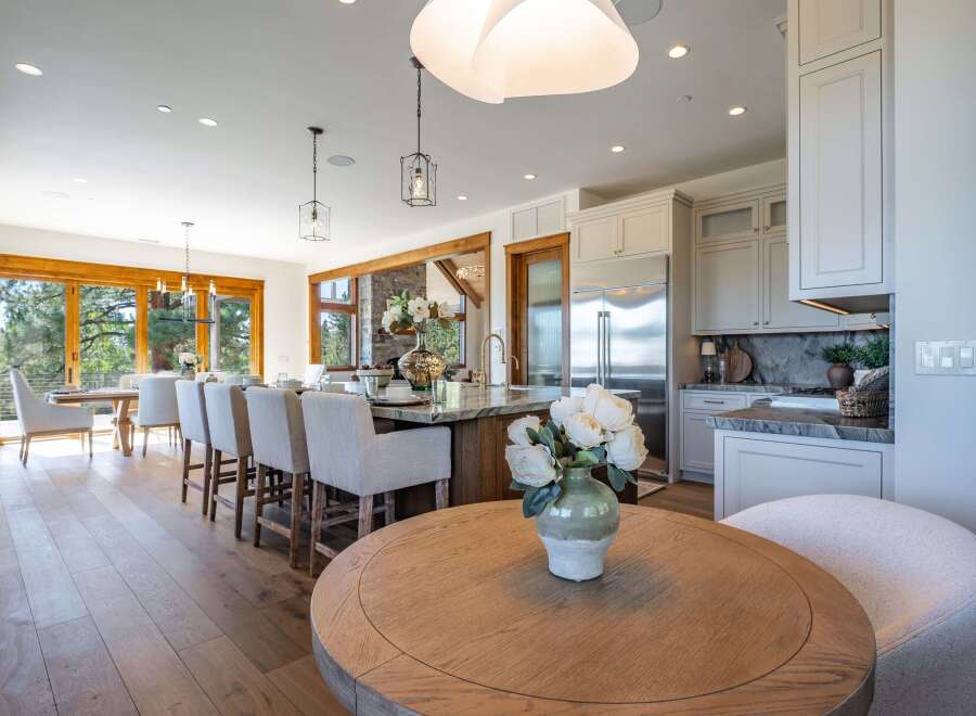 Experience luxurious open-concept living in this stunning kitchen and dining area, perfect for entertaining.