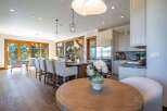 Experience luxurious open-concept living in this stunning kitchen and dining area, perfect for entertaining.