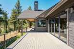 Experience seamless indoor-outdoor living with this expansive deck, perfect for entertaining or enjoying the serene natural surroundings.