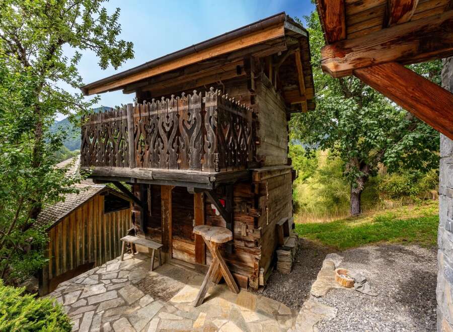Discover this charming rustic wooden cabin nestled in a serene natural setting.