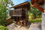 Discover this charming rustic wooden cabin nestled in a serene natural setting.