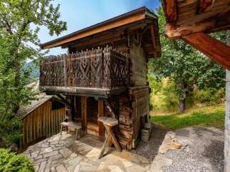 Discover this charming rustic wooden cabin nestled in a serene natural setting.
