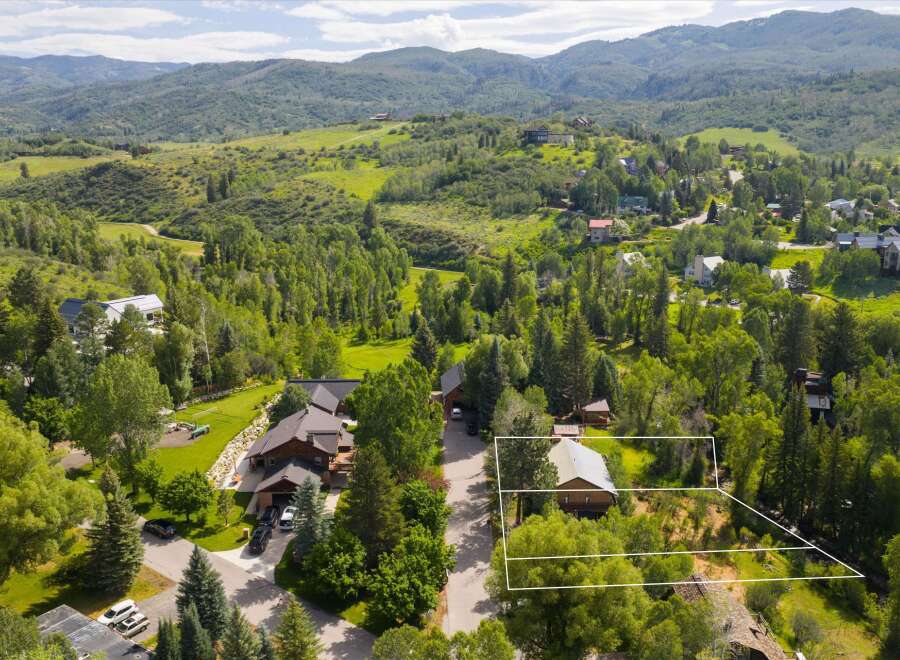 Nestled amidst lush greenery and rolling hills, this property offers a serene mountain retreat.