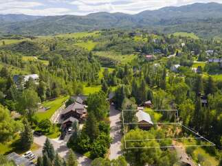 Nestled amidst lush greenery and rolling hills, this property offers a serene mountain retreat.