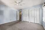 Discover ample storage in this spacious bedroom, featuring two large bi-fold closet doors.