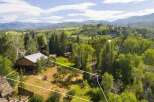Nestled amidst lush greenery and rolling hills, this property offers a serene mountain retreat.