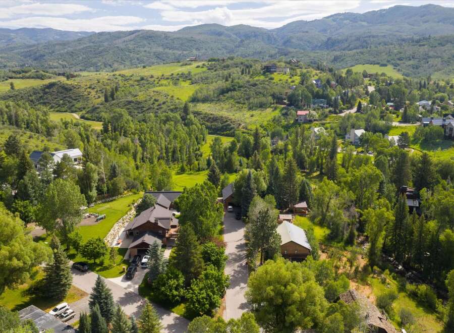 Nestled amidst lush greenery and rolling hills, this property offers a serene mountain retreat.