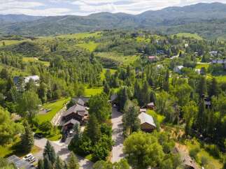Nestled amidst lush greenery and rolling hills, this property offers a serene mountain retreat.