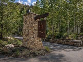 Welcome to Castle Rock, a stunning property nestled amidst a serene forest landscape.