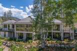 Experience luxury living in this stunning modern home, featuring expansive floor-to-ceiling windows that flood the interior with natural light and offer breathtaking views of the surrounding landscape.