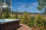 Experience ultimate relaxation with this luxurious hot tub, perfectly situated to offer breathtaking mountain views.