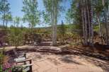 Experience the beauty of mountain living with this stunning outdoor patio, perfect for entertaining or quiet relaxation.