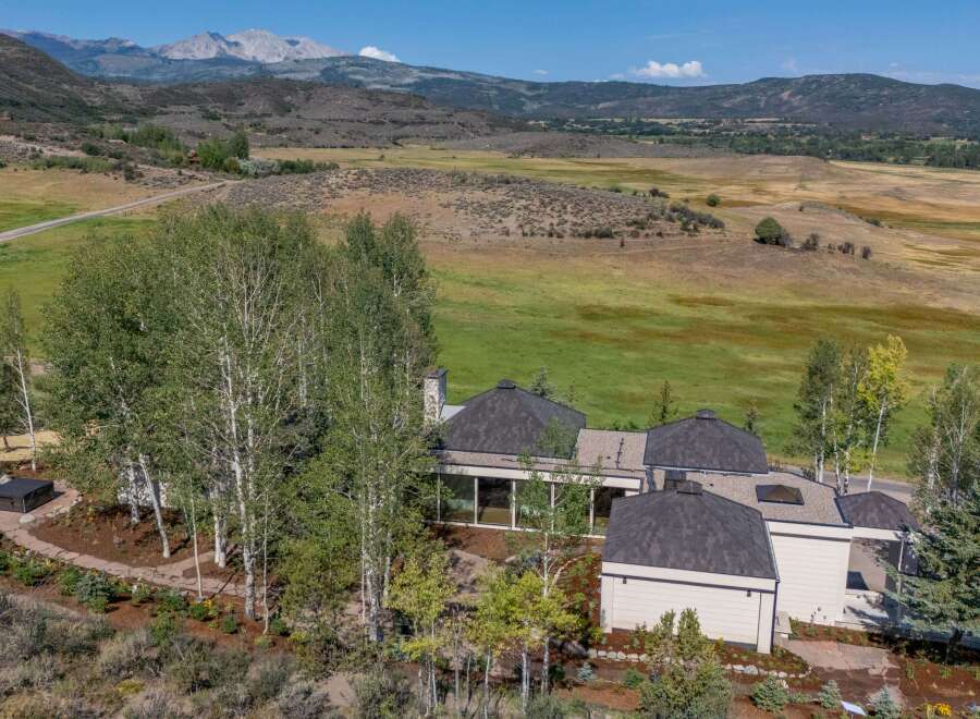 Nestled amidst rolling hills and majestic mountains, this stunning property offers a serene retreat.