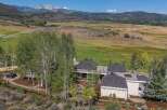 Nestled amidst rolling hills and majestic mountains, this stunning property offers a serene retreat.