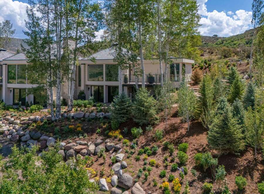 Nestled amidst a serene mountain landscape, this exquisite residence offers unparalleled luxury and breathtaking views.
