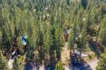 Nestled amidst a lush forest, this property offers a serene retreat with multiple charming cabins.