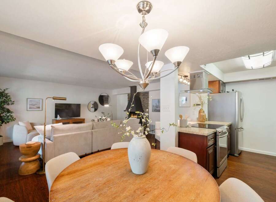 Experience open-concept living with this beautifully appointed dining and living area, perfect for entertaining.