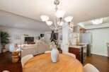 Experience open-concept living with this beautifully appointed dining and living area, perfect for entertaining.
