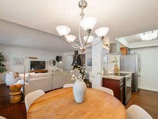 Experience open-concept living with this beautifully appointed dining and living area, perfect for entertaining.