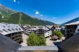Discover this charming property nestled in a picturesque mountain town, offering stunning views of the surrounding Alps.