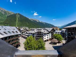 Discover this charming property nestled in a picturesque mountain town, offering stunning views of the surrounding Alps.